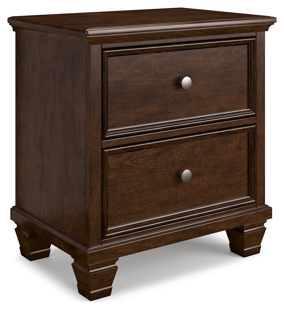 Brown two-drawer nightstand with two front drawers and round metal knobs