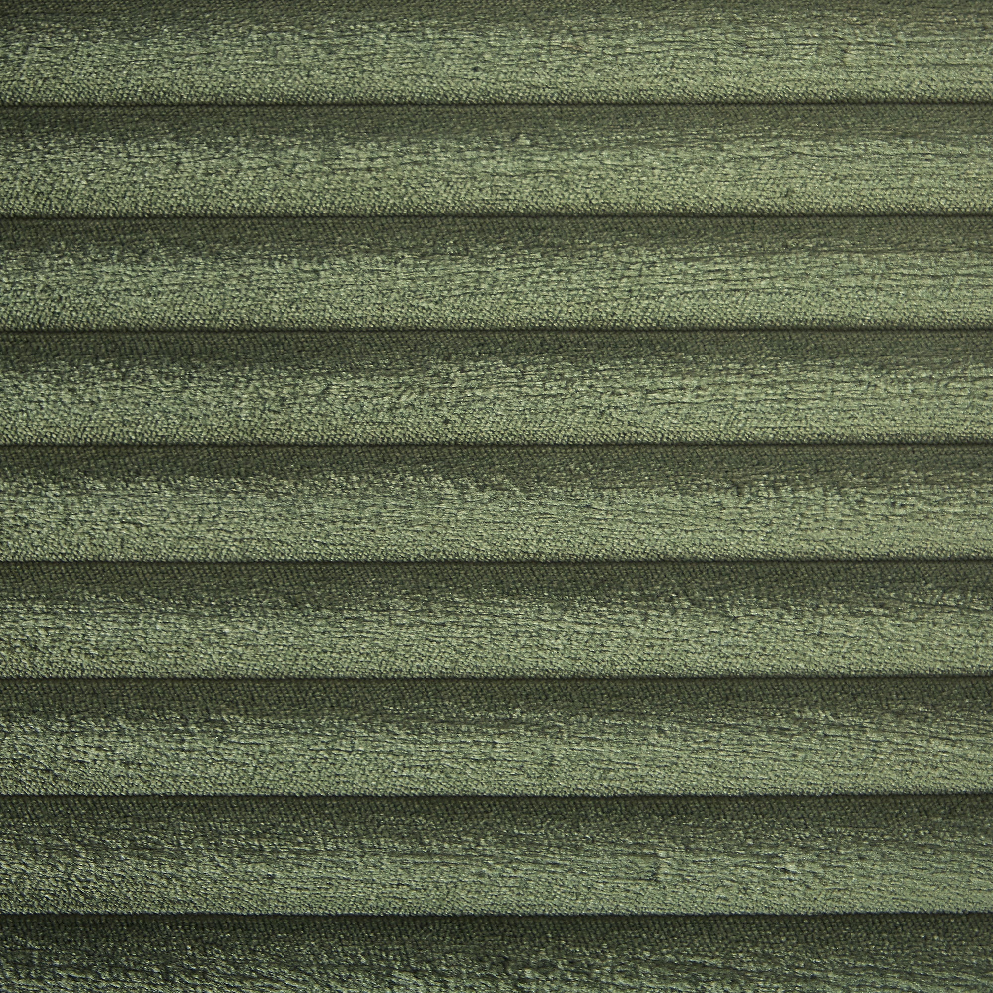 Close-up of green corduroy fabric with horizontal ribbed texture