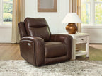 Brown power recliner with adjustable headrest and smooth padded seat