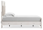 White panel bed with light gray mattress and open side panel; footboard storage not visible.