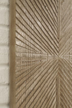 Distressed brown wall decor panel detail with radiating chevron grooves