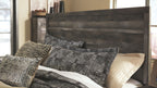 Panel bedroom set panel bed with dark wood headboard and gray patterned bedding