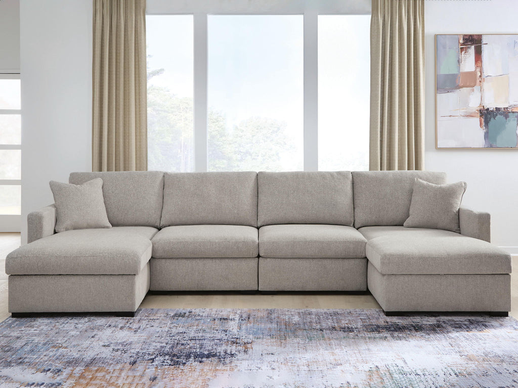 Gray corner sectional sofa with chaise seating and back cushions