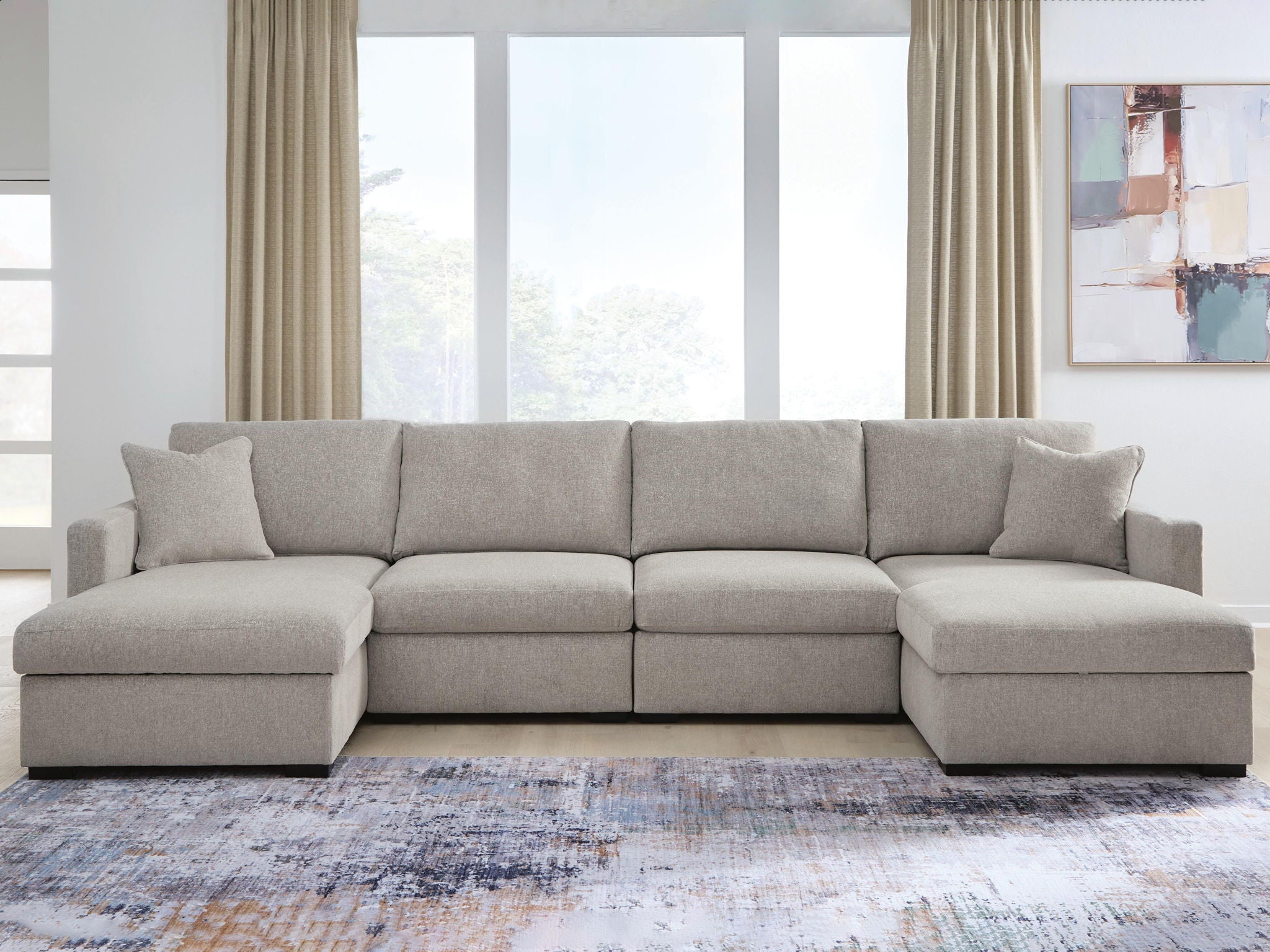 Gray corner sectional sofa with chaise seating and back cushions