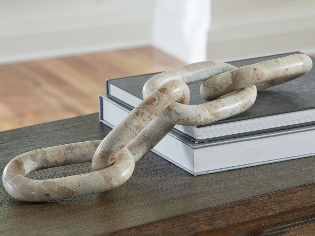 Light beige abstract sculpture with interlocking chain links, angled view