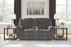 Charcoal reclining loveseat with console, plush back and padded seat cushions