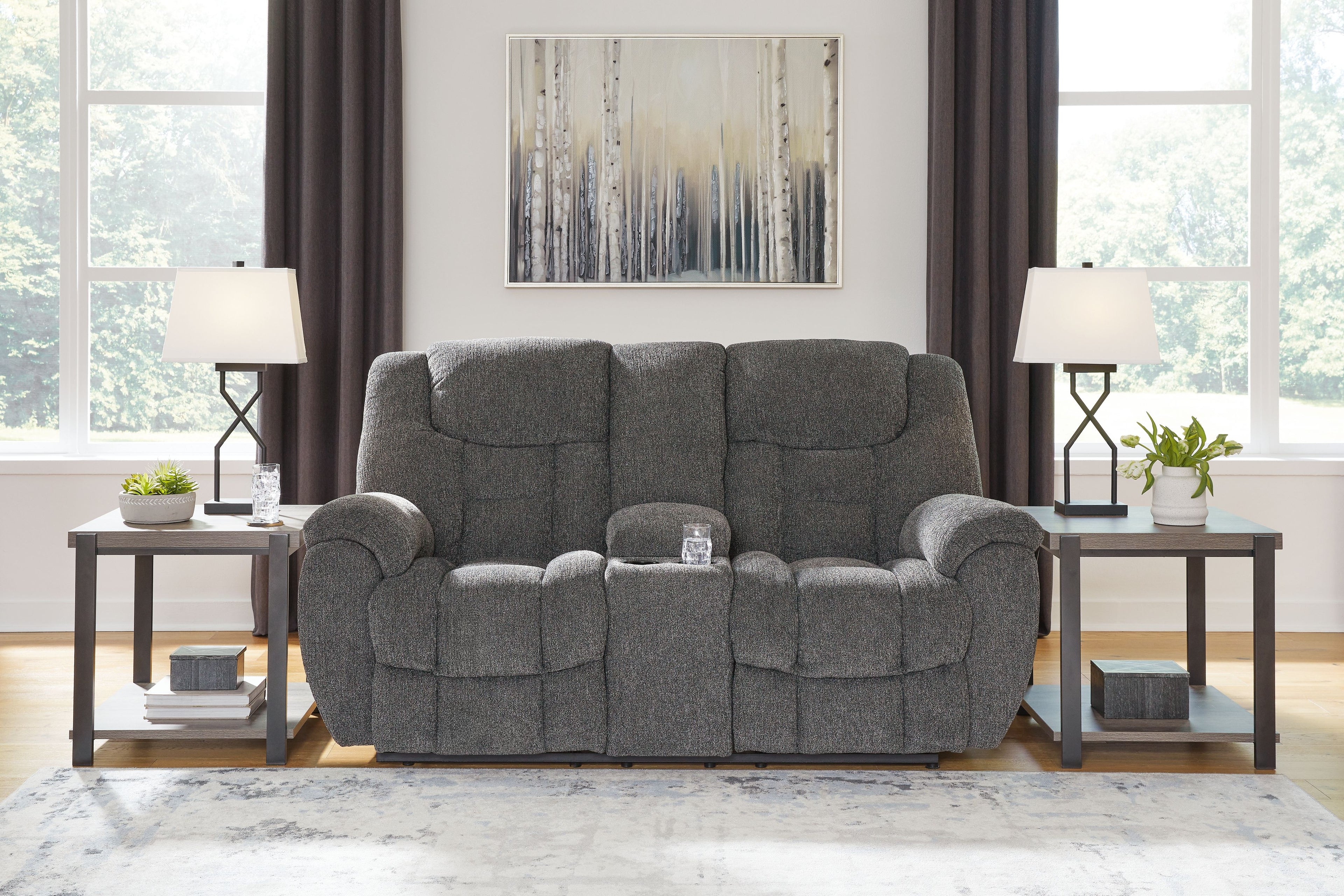 Charcoal reclining loveseat with console, plush back and padded seat cushions