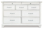Whitewash dresser with three top drawers and six lower drawers, metal bar pulls
