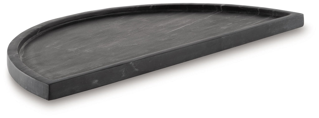 Black half-moon serving tray with dark stone-look surface and raised rim.