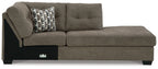 Chocolate-brown corner chaise sofa with tufted back, two-seat cushions, and patterned throw pillow