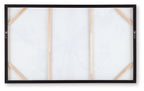 Framed wall art backing with gold corner supports and black frame