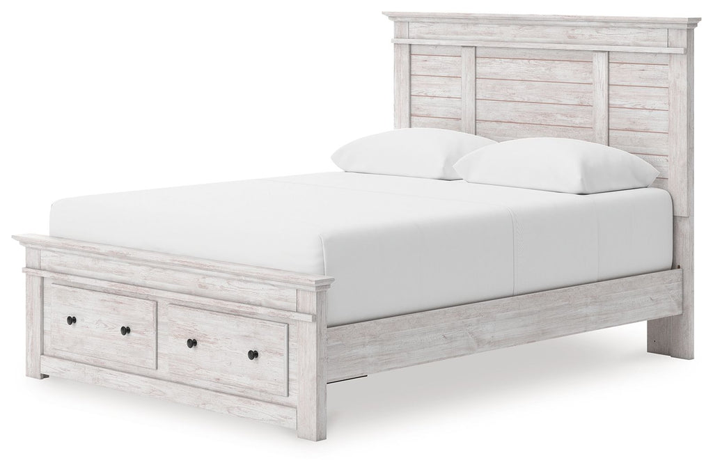 White panel storage bed with two drawer fronts and slatted mattress support