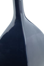 Blue glossy ceramic vase neck and upper body with smooth curved silhouette