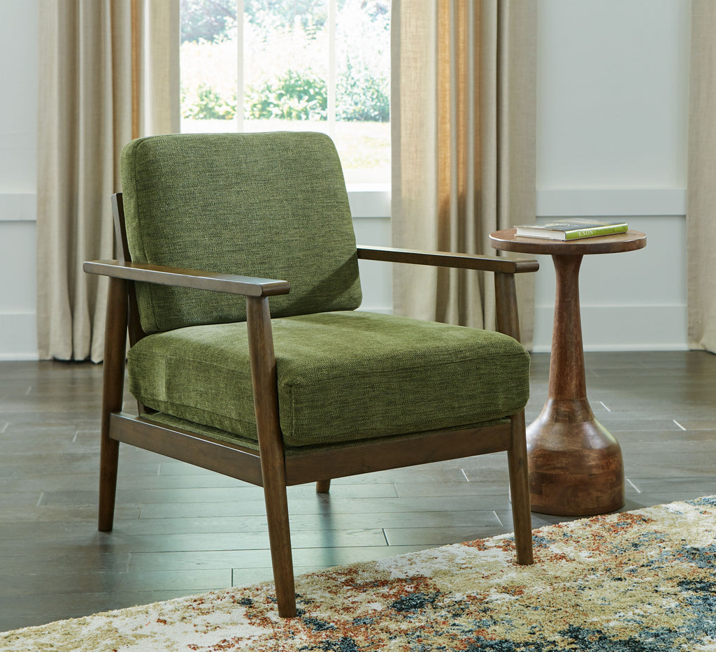 Green accent chair with upholstered seat and back, wood frame and arms