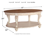 Oval cocktail table with brown oval top and white two-tier base