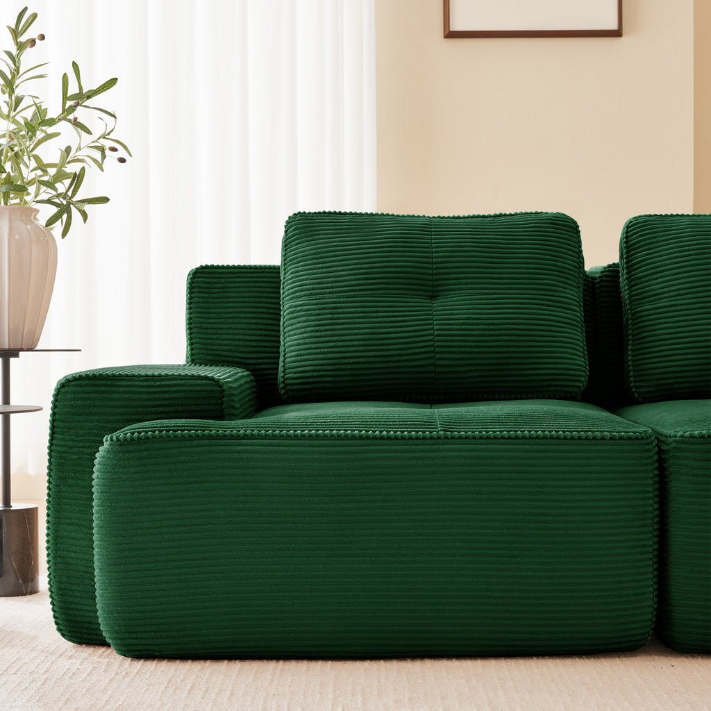 Green corduroy modular sectional sofa with seat and back cushions, ottoman corner