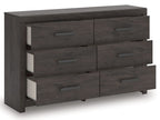 Charcoal six-drawer dresser with open drawers showing interior shelves and bar pulls.