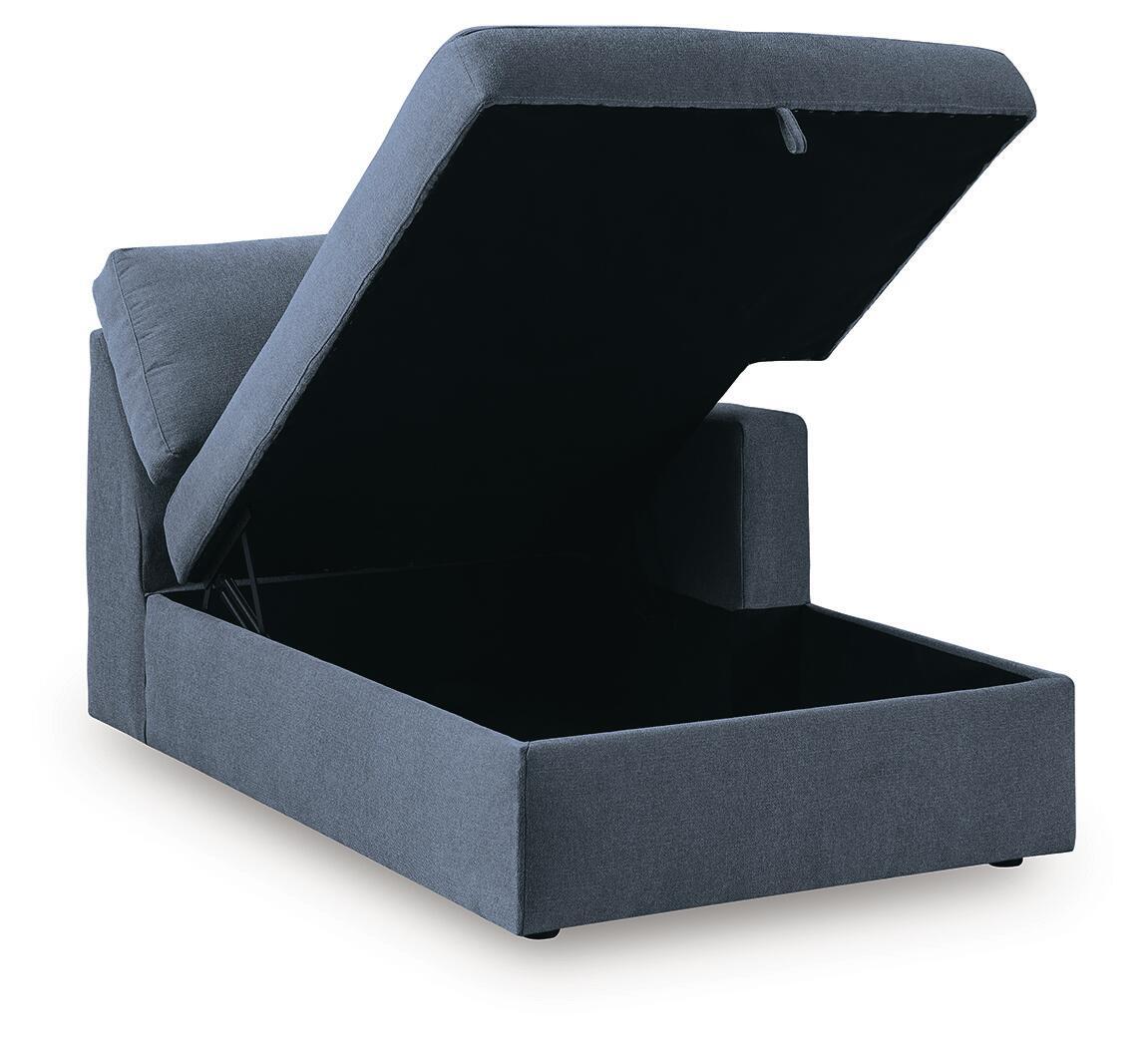 Ink blue corner chaise storage with lid open, upholstered interior
