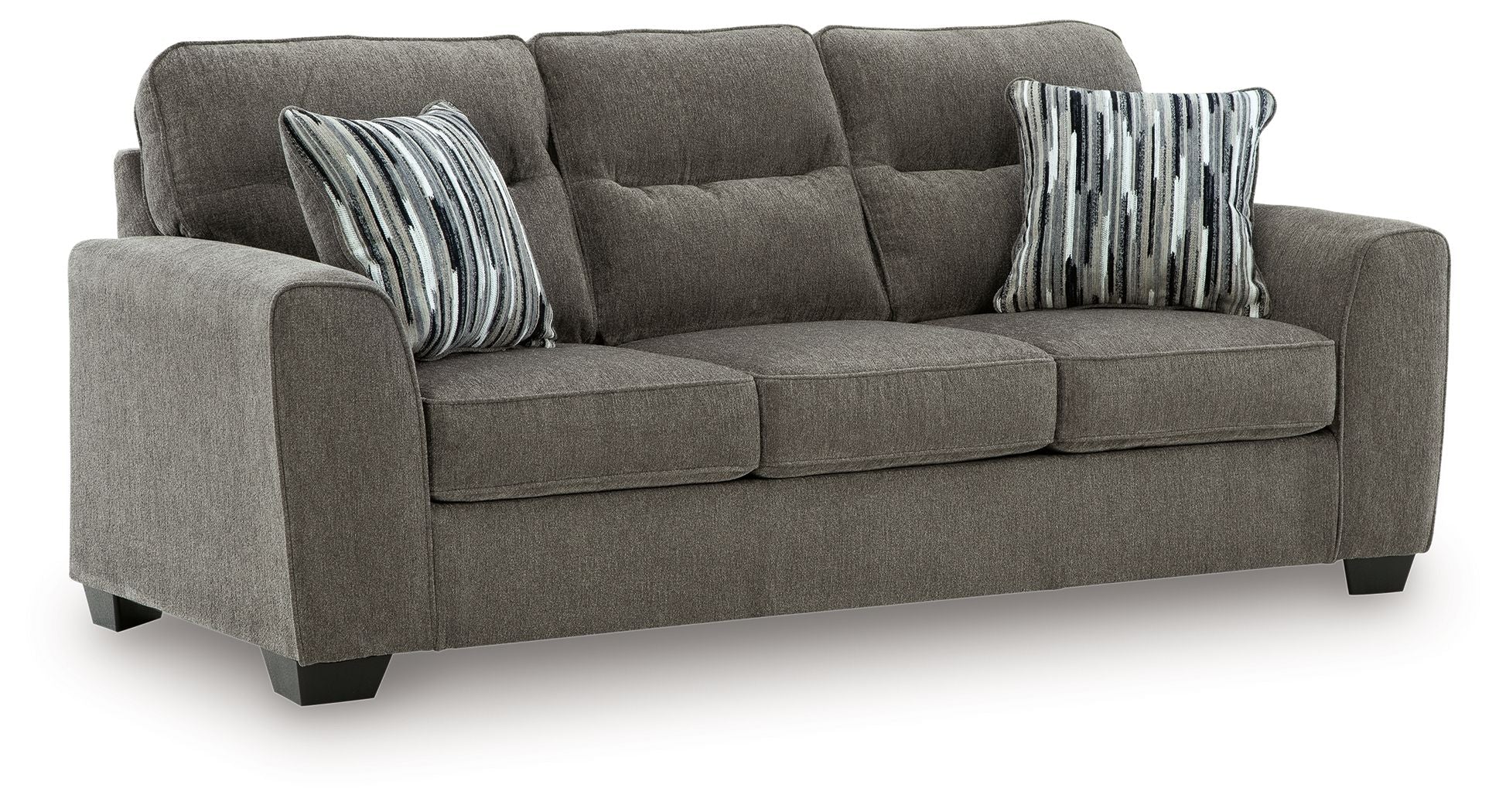 Dark gray fabric loveseat with tufted back, padded arms, and two striped throw pillows