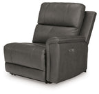 Power wall recliner chair in dark gray upholstery with padded headrest and armrests