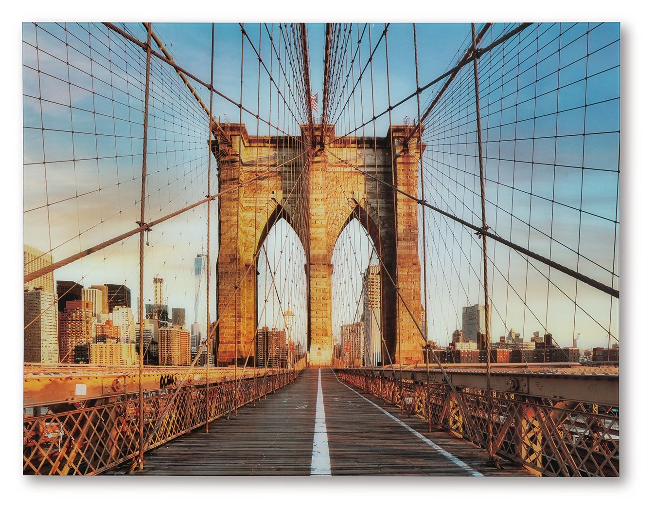 Framed wall art print of Brooklyn Bridge with blue sky and amber bridge structure