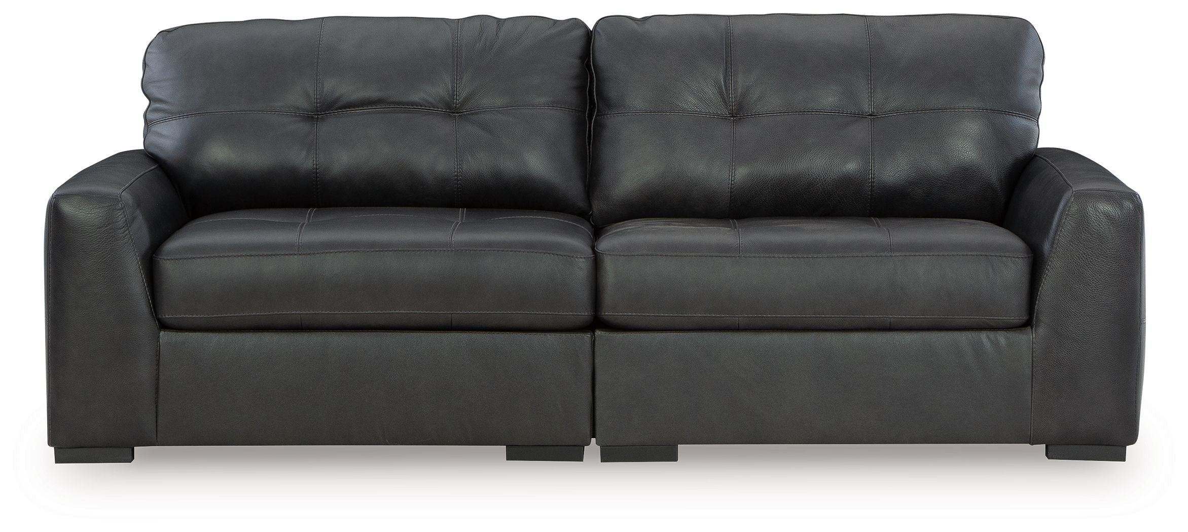 Dark upholstered sectional sofa with tufted back cushions and track arms
