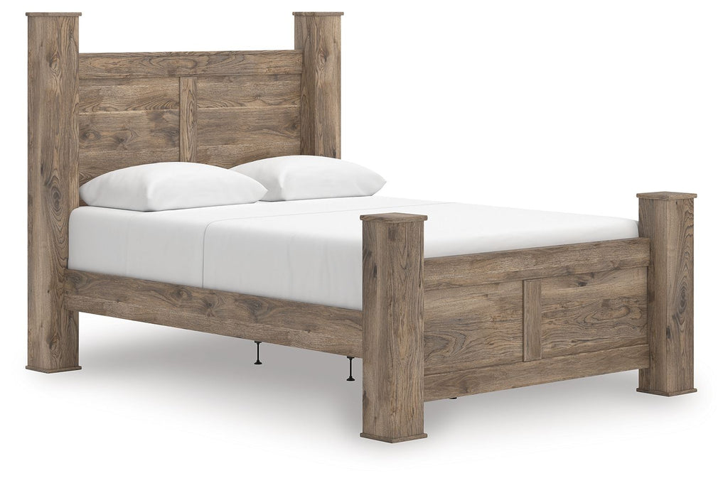 Light brown poster bed with white upholstered mattress and two pillows