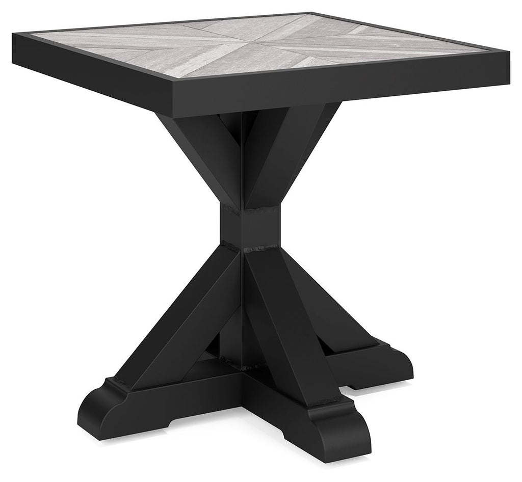 Black square end table with flat top and pedestal-style X-leg base
