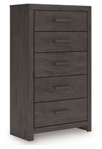 Charcoal five-drawer chest with five dark drawer pulls and flat top.