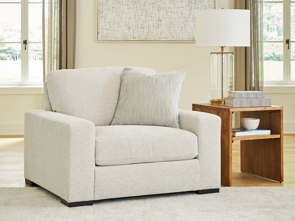 Upholstered chair and a half with seamed seat, two back pillows, beige linen upholstery