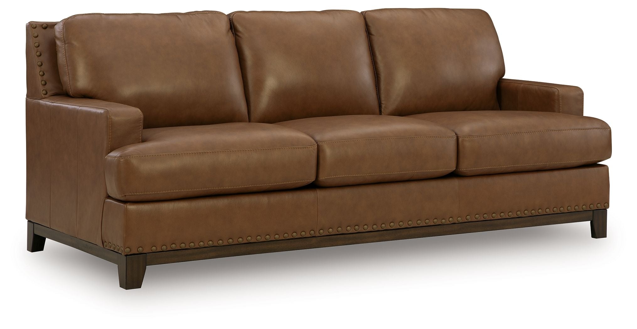 Saonara sofa in amber with rolled arms, three back cushions, and stitched base trim