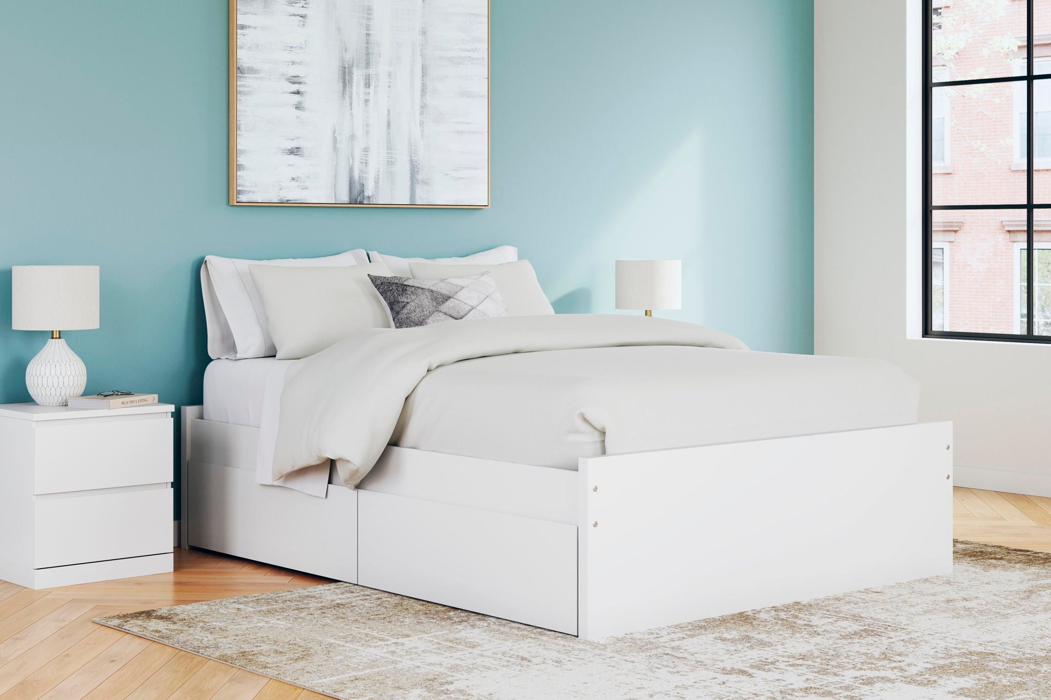 White platform bed with two side drawers, slat base, and bed pillows