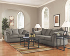 Living room set with light gray sofa and loveseat, square cushions and padded arms