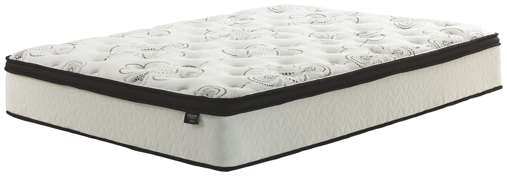 White hybrid mattress with quilted surface and black side border, angled view