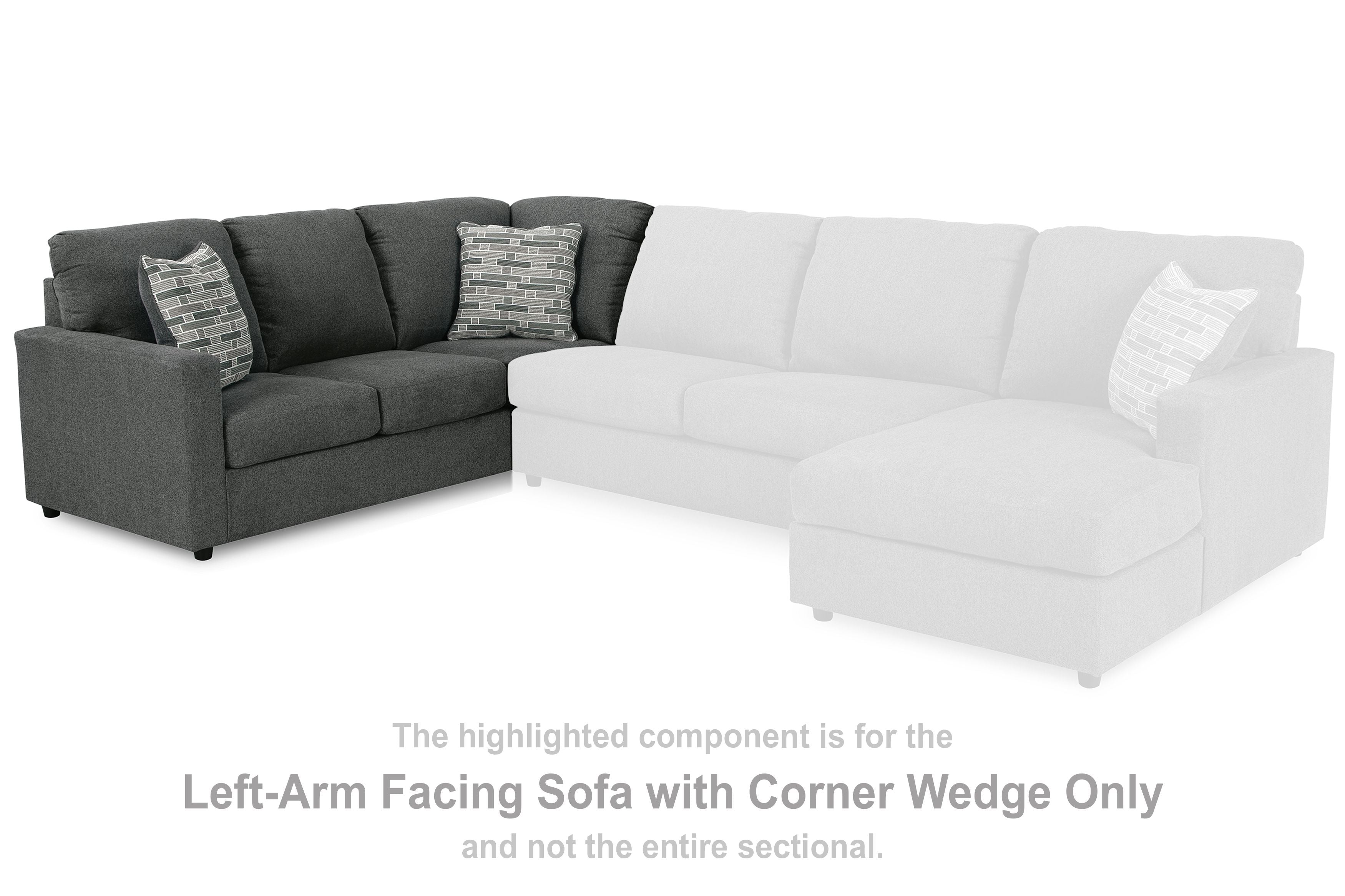 Charcoal sectional sofa with corner wedge, left-arm facing, and patterned throw pillows