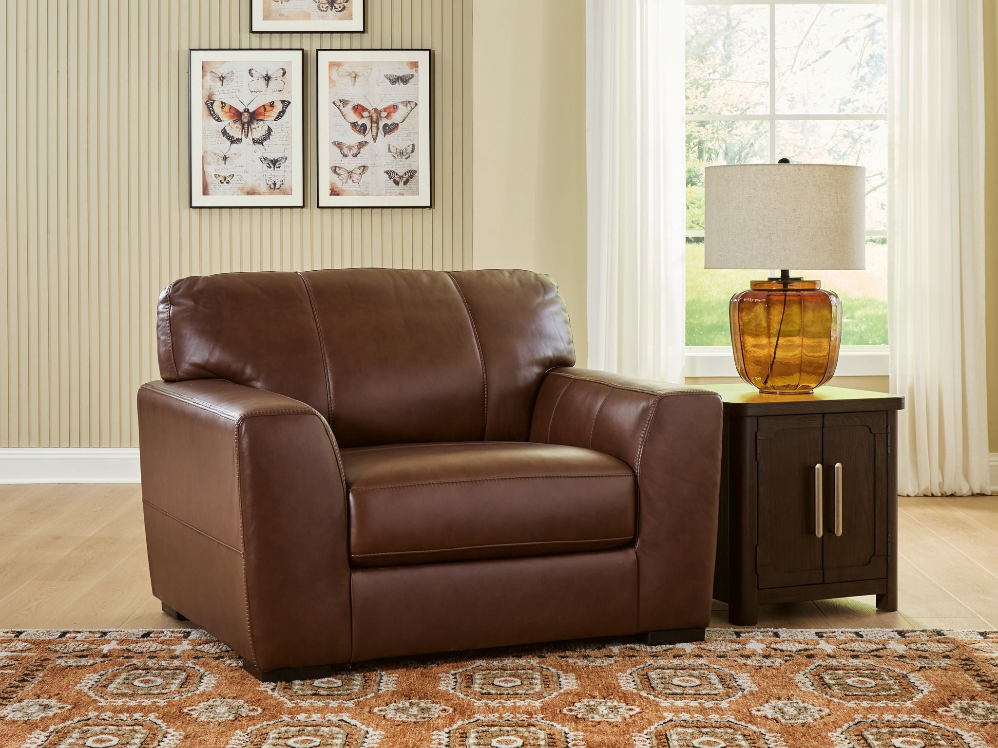Chair and a half armchair in dark brown leather with rolled arms and square legs