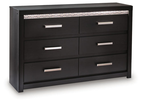Black six-drawer dresser with six silver bar handles and patterned top trim