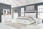 White bedroom set with panel storage dresser, mirror, and bed