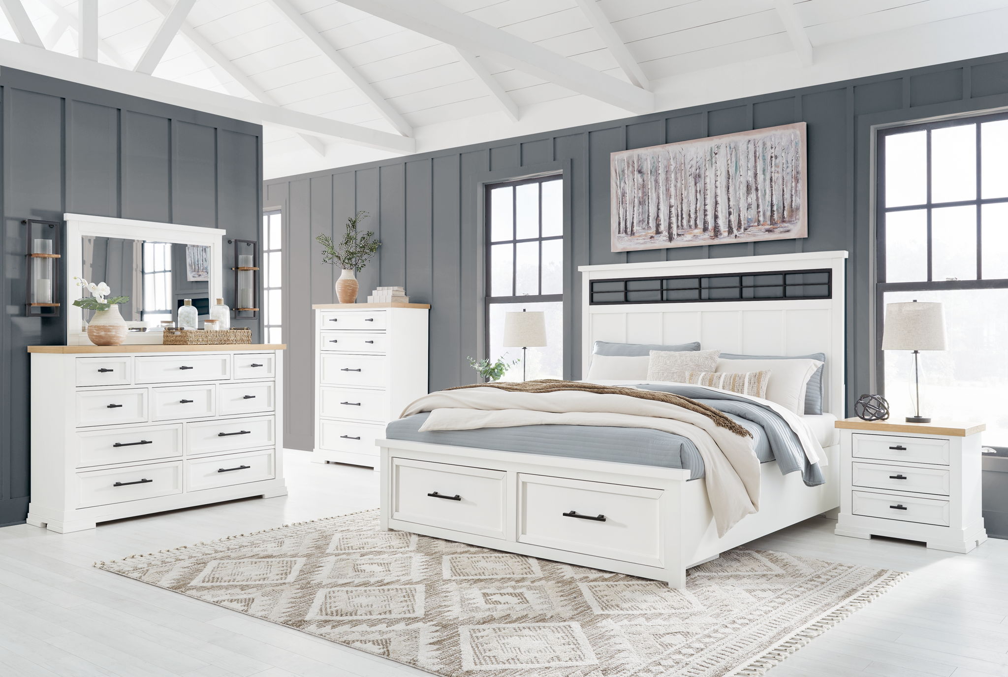 White bedroom set with panel storage dresser, mirror, and bed