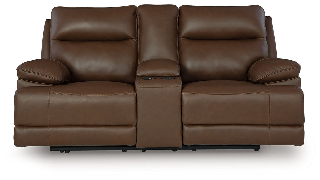 Power reclining loveseat in dark brown leather with console and padded armrests