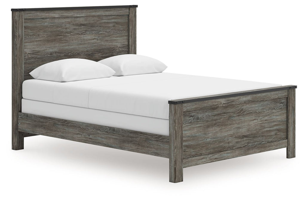 Gray panel bed with white upholstered mattress and pillow