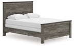 Gray panel bed with white upholstered mattress and pillow