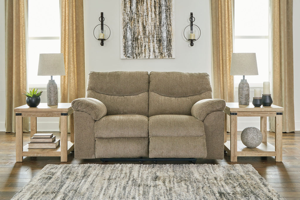 Taupe fabric sofa with rolled arms and three cushioned back panels