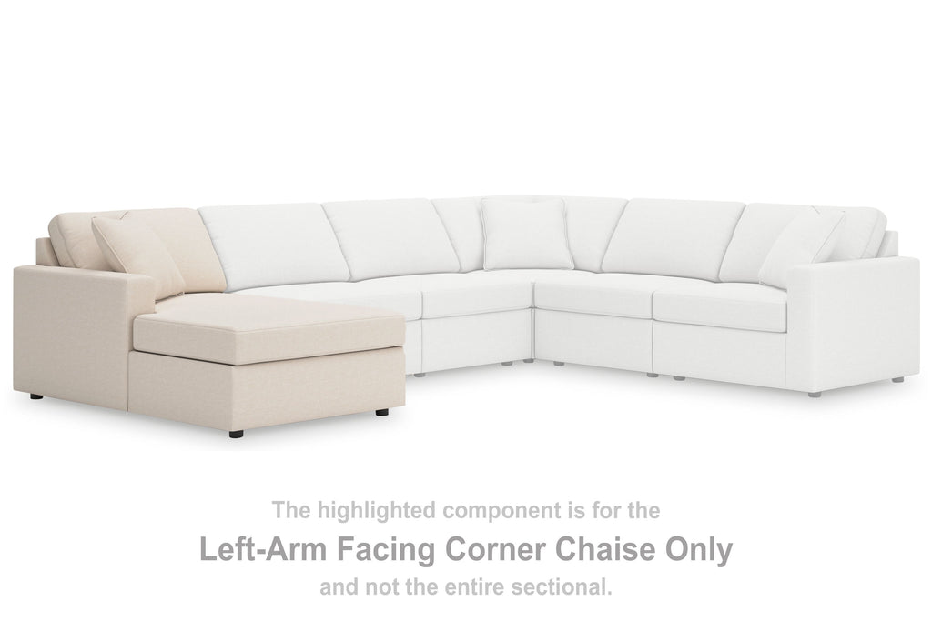 L-shaped corner chaise sectional with light oyster upholstery and multiple back cushions