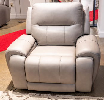 Light gray power recliner chair with padded back and armrests