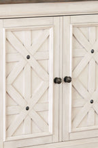 Beige buffet cabinet doors with diamond panel details and round knobs