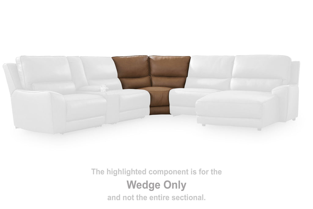 Caramel upholstered sectional wedge with square arms, highlighted at center