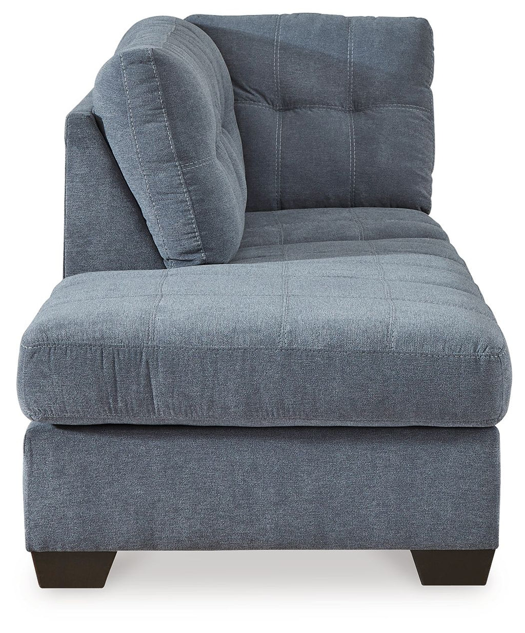 Blue fabric corner chaise end with rounded tufted back and thick seat cushion
