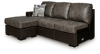 Dark sofa chaise with chaise ottoman and three back cushions