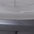 Dark base surface with textured finish for a glass cylinder candle holder